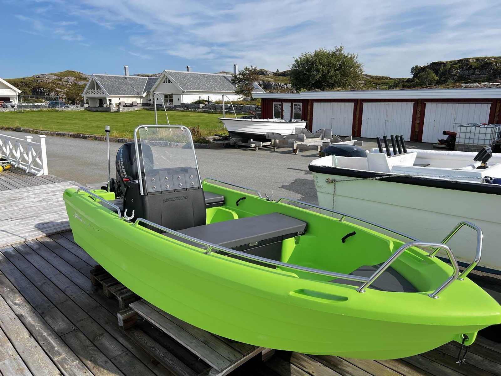 Small 9.9 hp boat at the mooring, Ekkilsøy
