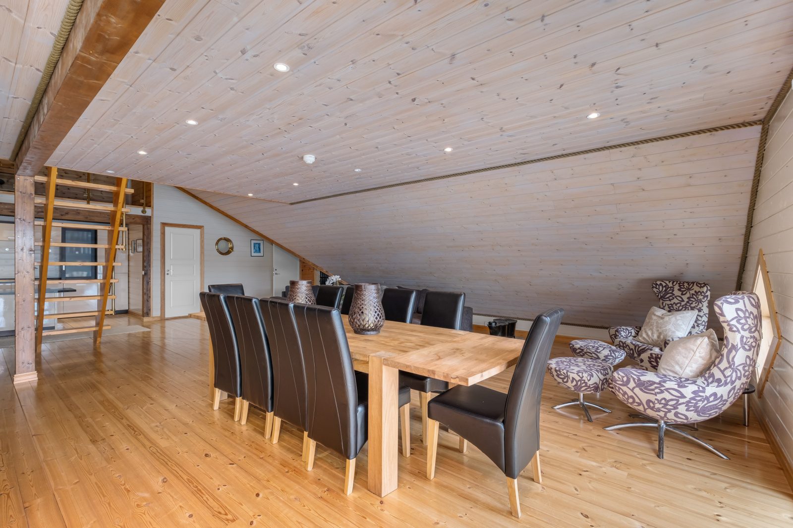 Atlantic Grand — dining room with large table and ship-style ladder staircase