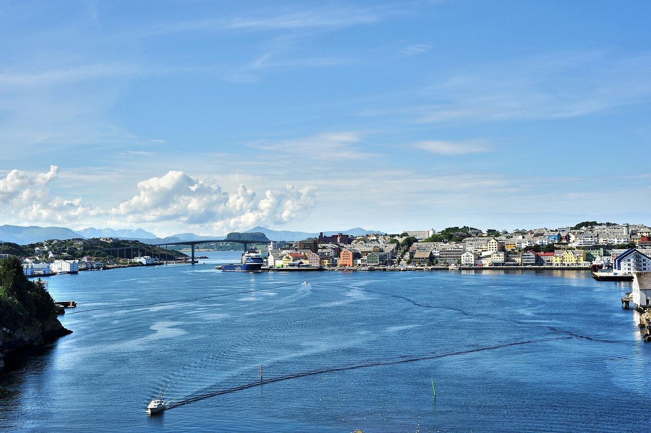 Kristiansund harbour waterfront with boats and colourful buildings, Norway