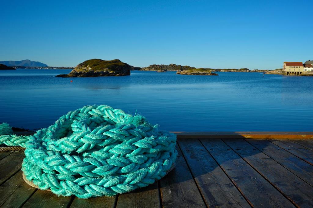 Sunny summer day on the dock with calm blue sea