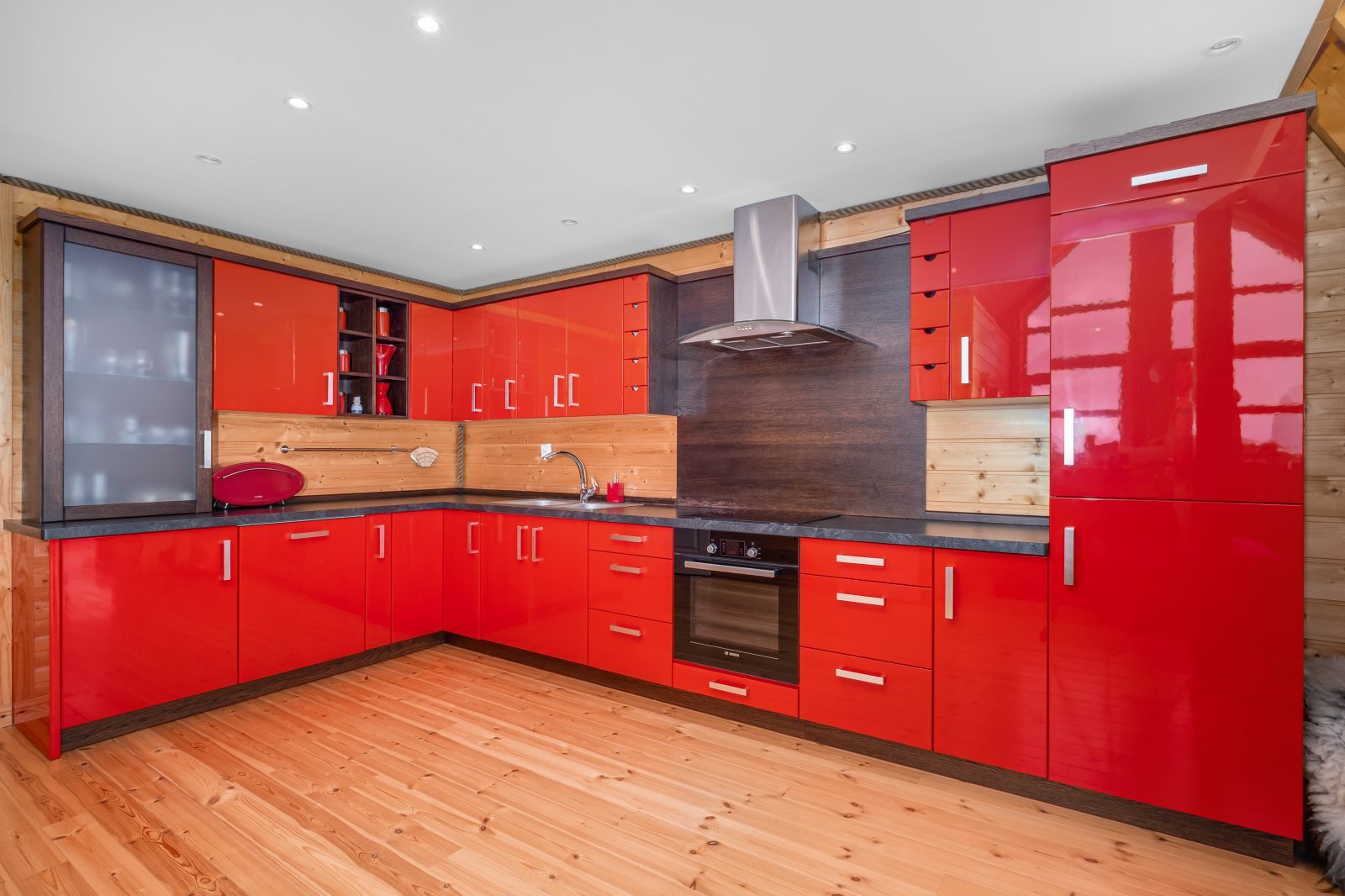 Sea View — L-shaped red kitchen