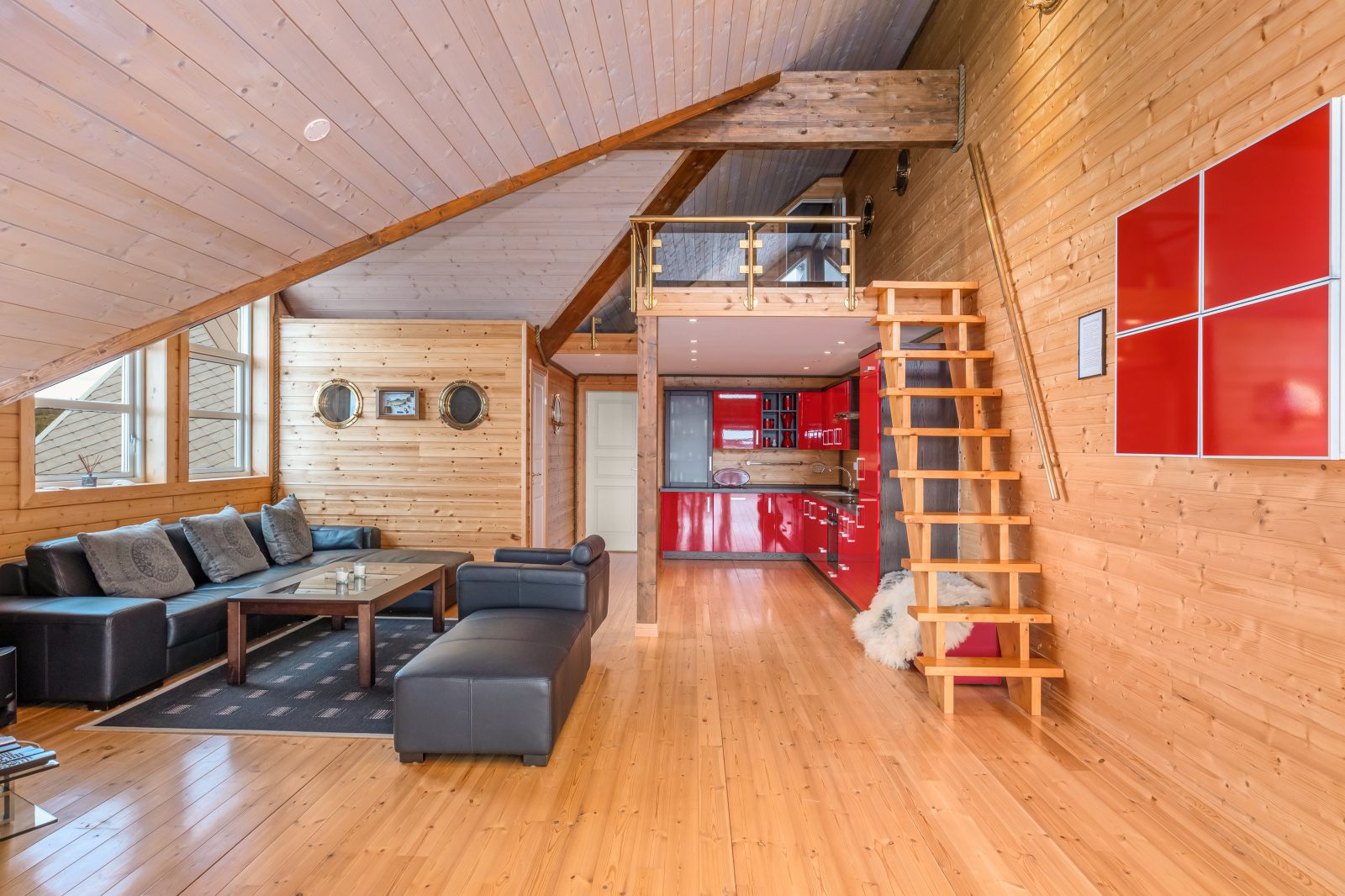 Sea View — open-plan living with sea view through floor-to-ceiling windows